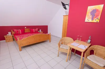 Ein Bett oder Betten in einem Zimmer der Unterkunft Weingut Christian Bucher