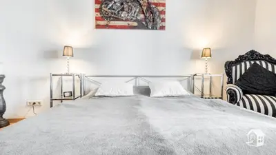 Ein Bett oder Betten in einem Zimmer der Unterkunft VILLA RHEINSTEIN AM SCHLOSS ENGERS
