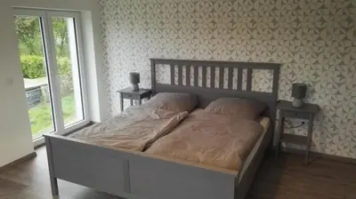 Ein Bett oder Betten in einem Zimmer der Unterkunft Eifel Ferienwohnung