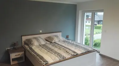Ein Bett oder Betten in einem Zimmer der Unterkunft Eifel Ferienwohnung