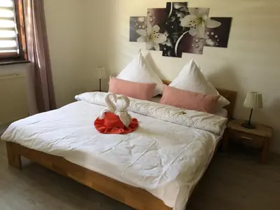 Ein Bett oder Betten in einem Zimmer der Unterkunft Sternenhimmel 2
