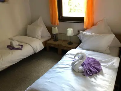 Ein Bett oder Betten in einem Zimmer der Unterkunft Sternenhimmel 2