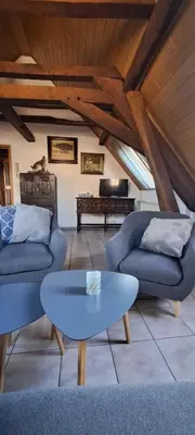 Ein Sitzbereich in der Unterkunft Ferienwohnung Flämisches Weinhaus