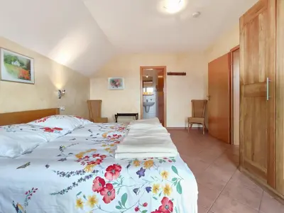 Ein Bett oder Betten in einem Zimmer der Unterkunft 4 Kreuzstraße Laaschhof