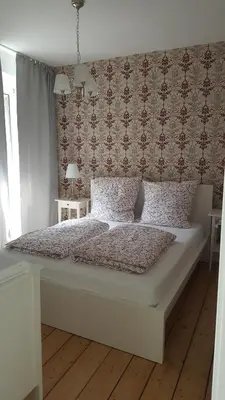 Ein Bett oder Betten in einem Zimmer der Unterkunft Ferienhaus BARFLY