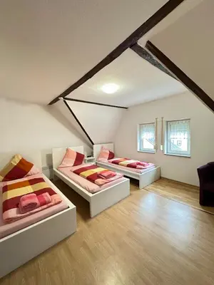 Ein Bett oder Betten in einem Zimmer der Unterkunft Holiday Apartment Adenau