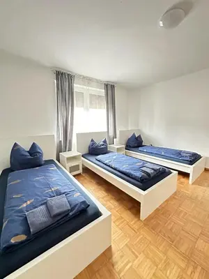 Ein Bett oder Betten in einem Zimmer der Unterkunft Holiday Apartment Adenau