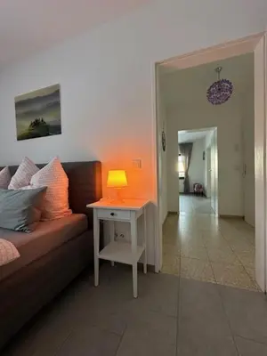 Ein Bett oder Betten in einem Zimmer der Unterkunft Ferienwohnung EIRA