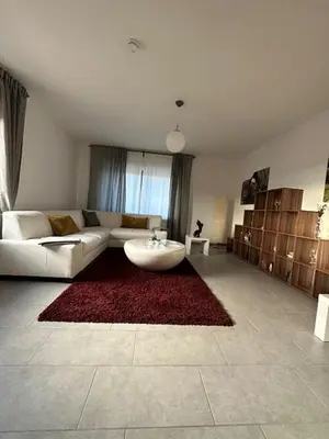 Ein Sitzbereich in der Unterkunft Ferienwohnung EIRA