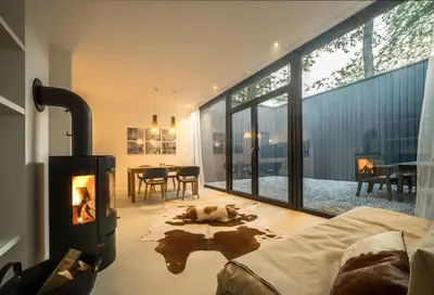 Ein Bett oder Betten in einem Zimmer der Unterkunft Architektur Ferienhaus Eifel SUITE17