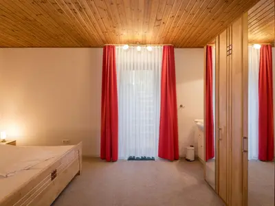 Ein Bett oder Betten in einem Zimmer der Unterkunft Holiday Home Eifelnatur - Haus 2-4 by Interhome