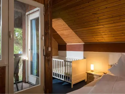 Ein Bett oder Betten in einem Zimmer der Unterkunft Holiday Home Eifelnatur - Haus 2-4 by Interhome