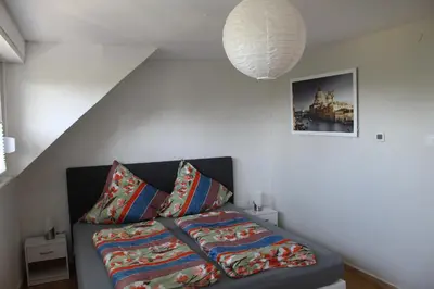 Ein Bett oder Betten in einem Zimmer der Unterkunft Ferienhaus Milena
