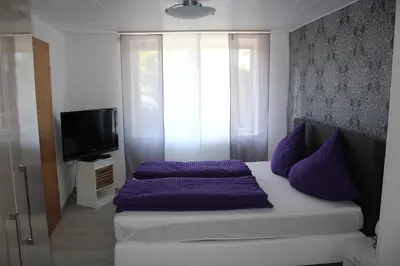 Ein Bett oder Betten in einem Zimmer der Unterkunft Ferienhaus Milena