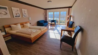 Ein Bett oder Betten in einem Zimmer der Unterkunft Weinhaus Stettler
