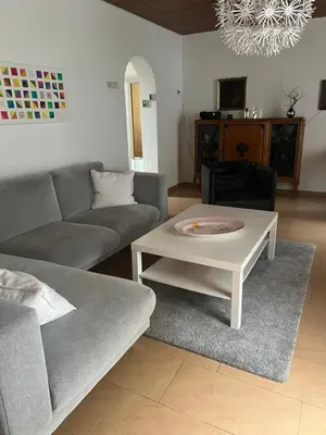 Ein Sitzbereich in der Unterkunft Ferienwohnung Lahnmündung