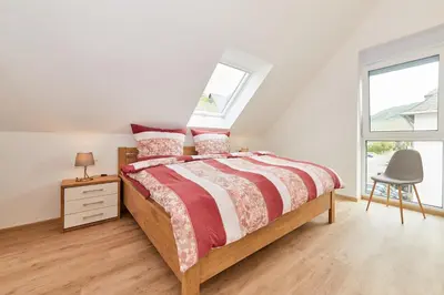 Ein Bett oder Betten in einem Zimmer der Unterkunft Susannes Burgblick