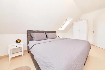 Ein Bett oder Betten in einem Zimmer der Unterkunft Ferienwohnung Bella Vista