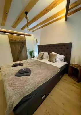 Ein Bett oder Betten in einem Zimmer der Unterkunft Mya Lenas Suite