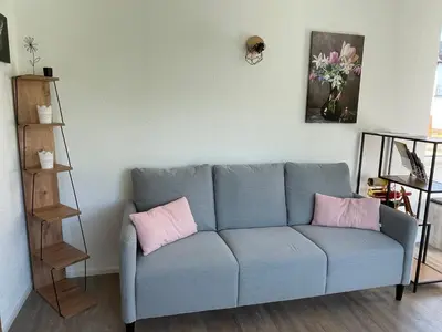 Ein Sitzbereich in der Unterkunft Ferienbungalow Kampenheissji