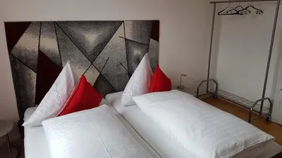 Ein Bett oder Betten in einem Zimmer der Unterkunft White House (1f) Boppard City