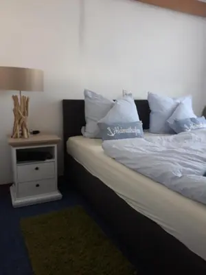 Ein Bett oder Betten in einem Zimmer der Unterkunft Rathausschenke Münstermaifeld