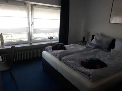 Ein Bett oder Betten in einem Zimmer der Unterkunft Rathausschenke Münstermaifeld