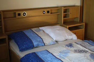 Ein Bett oder Betten in einem Zimmer der Unterkunft Ferienhaus Cilla