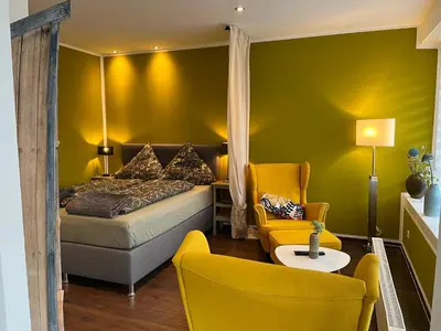 Ein Bett oder Betten in einem Zimmer der Unterkunft Ferienwohnung2 Daun