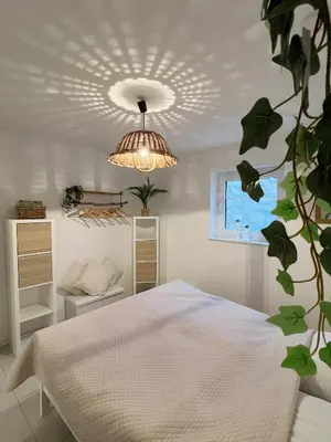 Ein Bett oder Betten in einem Zimmer der Unterkunft Ferienwohnung im Hunsrück Neubau