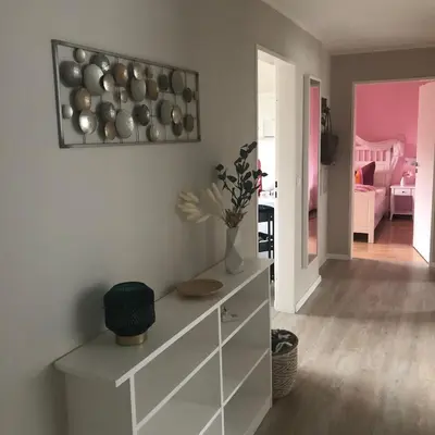 Ein Bett oder Betten in einem Zimmer der Unterkunft Grandezza Ferienwohnungen Erpeldinger