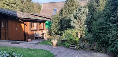 Ein Garten an der Unterkunft Waldhaus