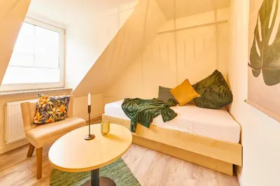 Ein Bett oder Betten in einem Zimmer der Unterkunft Rochter Landhotel