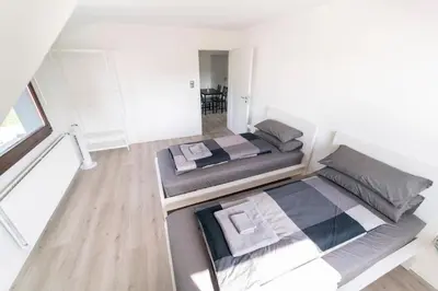 Ein Bett oder Betten in einem Zimmer der Unterkunft North Loop Rooms