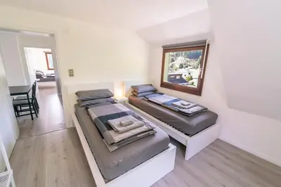 Ein Bett oder Betten in einem Zimmer der Unterkunft North Loop Rooms