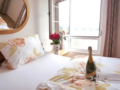 Ein Bett oder Betten in einem Zimmer der Unterkunft Hotel Vater Rhein