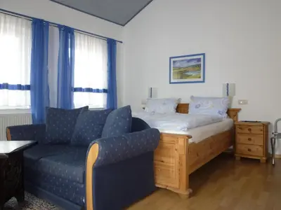Ein Bett oder Betten in einem Zimmer der Unterkunft Hotel Vater Rhein