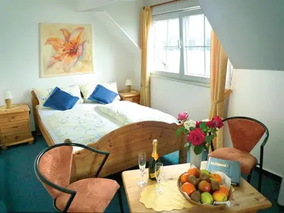 Ein Bett oder Betten in einem Zimmer der Unterkunft Hotel Vater Rhein
