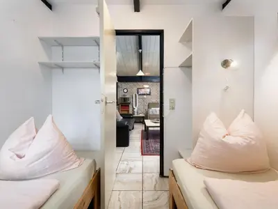 Ein Bett oder Betten in einem Zimmer der Unterkunft Holiday Home Haus 11 by Interhome