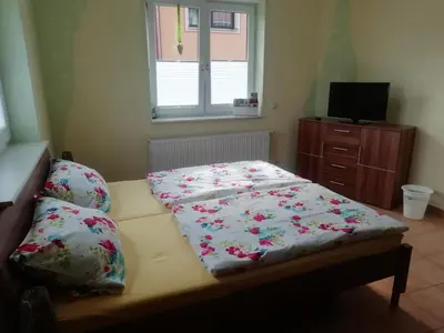 Ein Bett oder Betten in einem Zimmer der Unterkunft Ferienwohnung Hermann