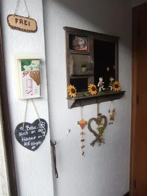 Ein Zertifikat, Auszeichnung, Logo oder anderes Dokument, das in der Unterkunft Pension / Ferienwohnungen Scheid ausgestellt ist