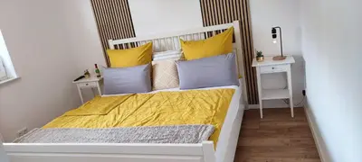 Ein Bett oder Betten in einem Zimmer der Unterkunft Ferienwohnung Fred