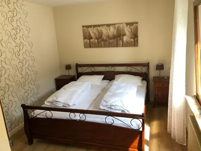 Ein Bett oder Betten in einem Zimmer der Unterkunft vakantiehuismoezel