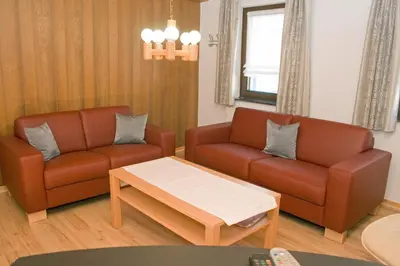 Ein Sitzbereich in der Unterkunft Ferienhaus Alina