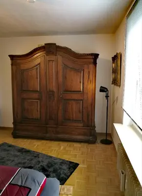 Ein Bett oder Betten in einem Zimmer der Unterkunft Ferienwohnung Confluentia in der Koblenzer Altstadt
