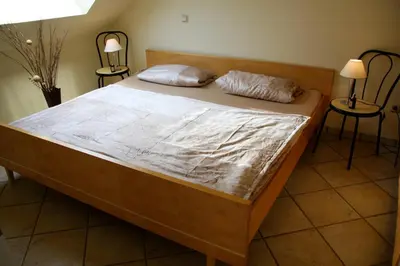 Ein Bett oder Betten in einem Zimmer der Unterkunft Landhaus Gräfendhron