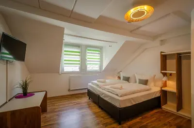 Ein Bett oder Betten in einem Zimmer der Unterkunft MoselUnion - 