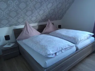 Ein Bett oder Betten in einem Zimmer der Unterkunft Ferienhaus Schöne Aussicht
