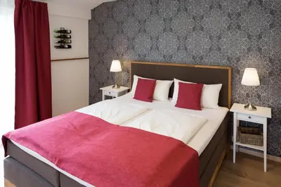 Ein Bett oder Betten in einem Zimmer der Unterkunft Hotel Restaurant Sonnenlay