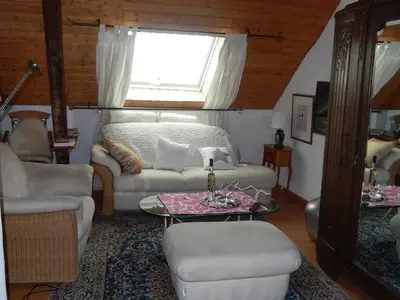 Ein Sitzbereich in der Unterkunft Apartment Altes Winzerhaus